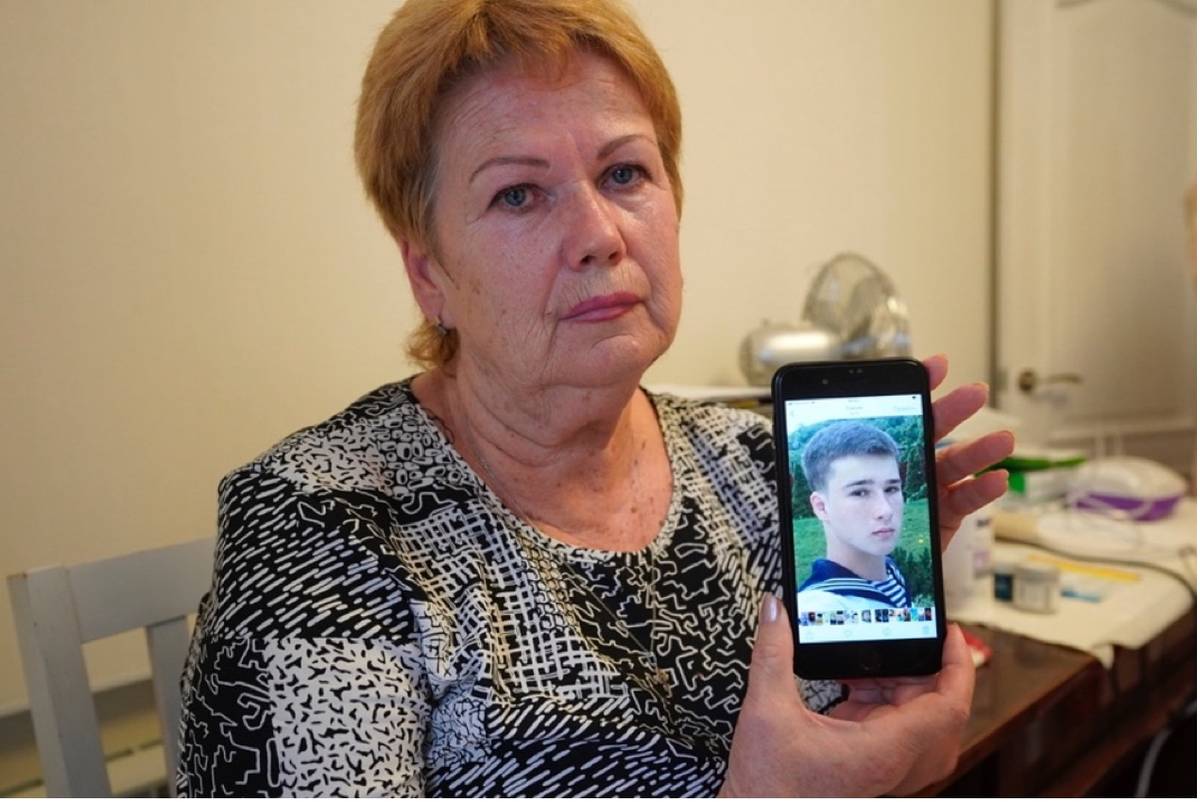 Lubov Borts shows a photo of Mark, Inna’s son,