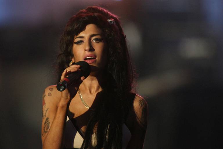  Amy Winehouse performs at a concert in celebration of Nelson Mandela's life at Hyde Park on June 27, 2008 in London, England. (Dan Kitwood/Getty Images)