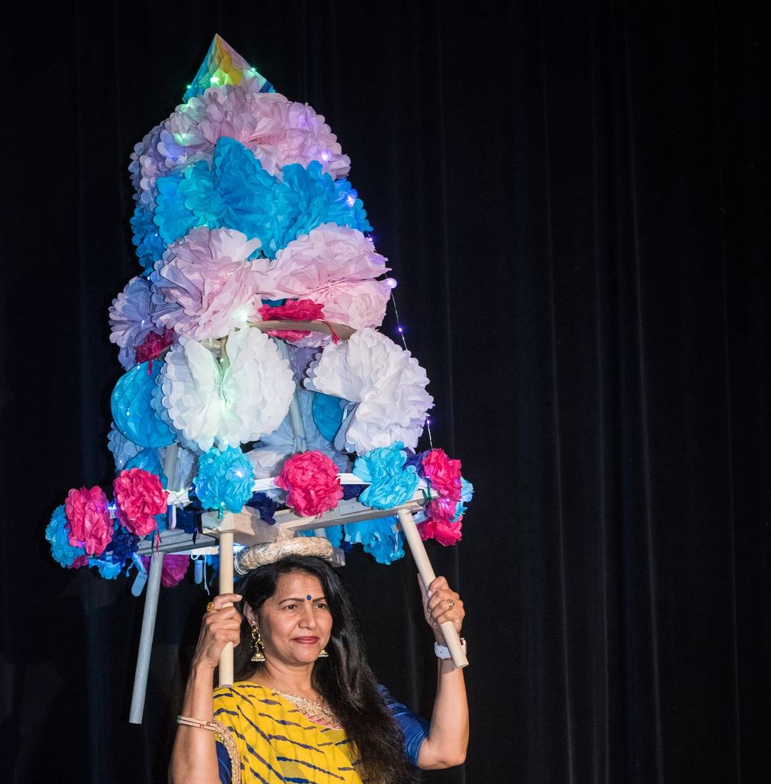 Manisha Patel holds a flower garbo, an integral element of Navaratri, the nine-night autumn festival honoring the power of the divine feminine, at the Hindu Society of North Carolina in Morrisville