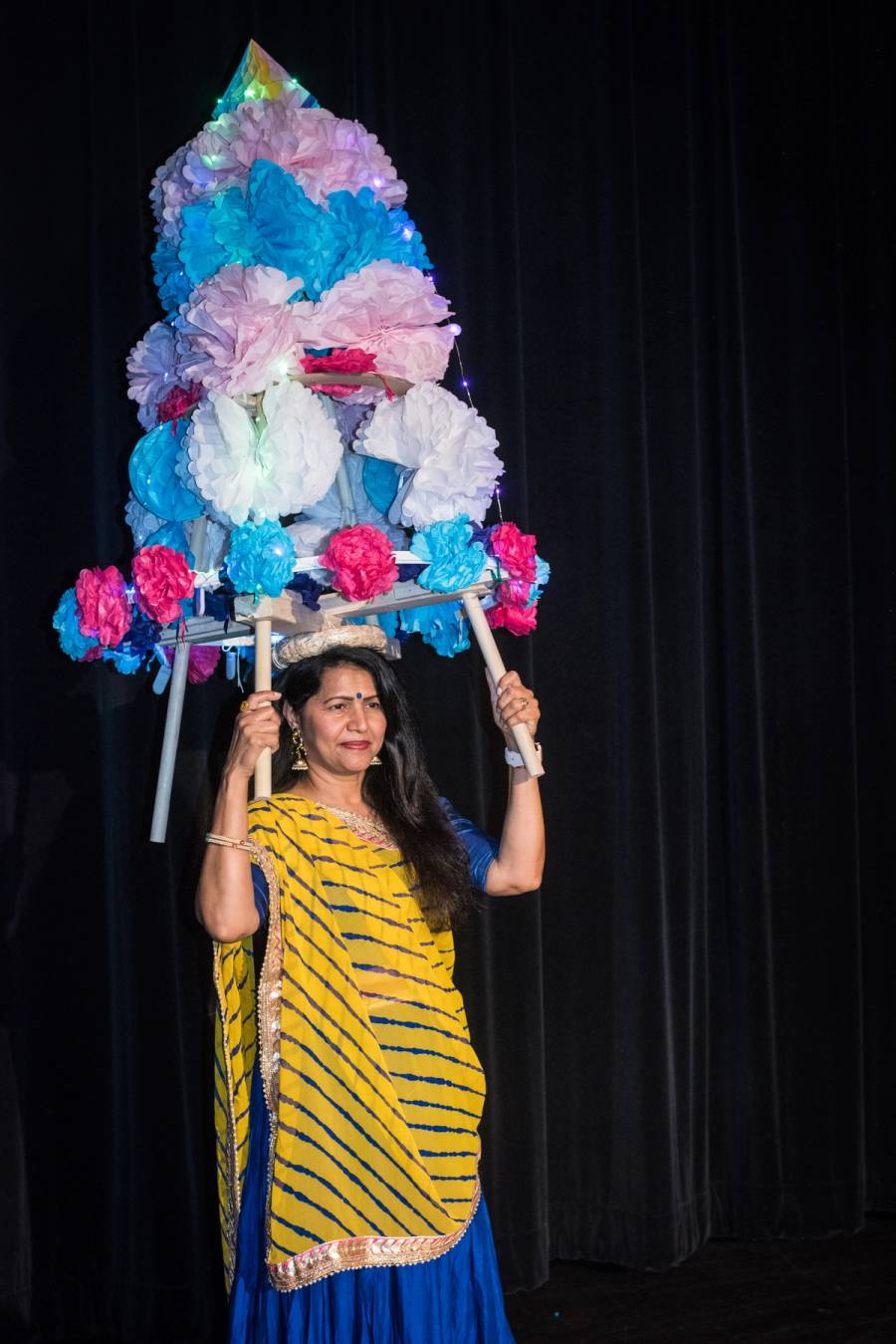 Manisha Patel holds a flower garbo, an integral element of Navaratri, the nine-night autumn festival honoring the power of the divine feminine, at the Hindu Society of North Carolina in Morrisville