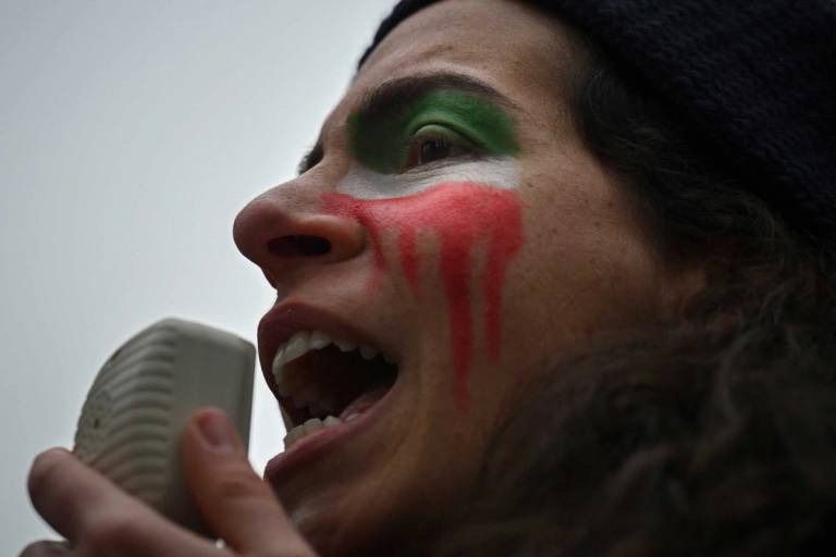 Activists from Woman, Life, Freedom, a New York-based Iranian women’s rights group, attend a rally in New York on March 11, 2023