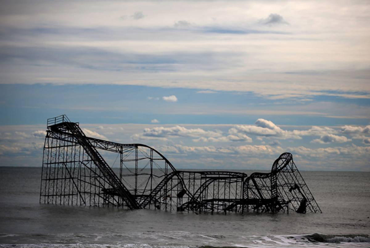 A roller coaster sits in the Atlantic Ocean after the Fun Town pier it sat on was destroyed by Superstorm Sandy in Seaside Heights, New Jersey.(Mark Wilson/Getty Images)