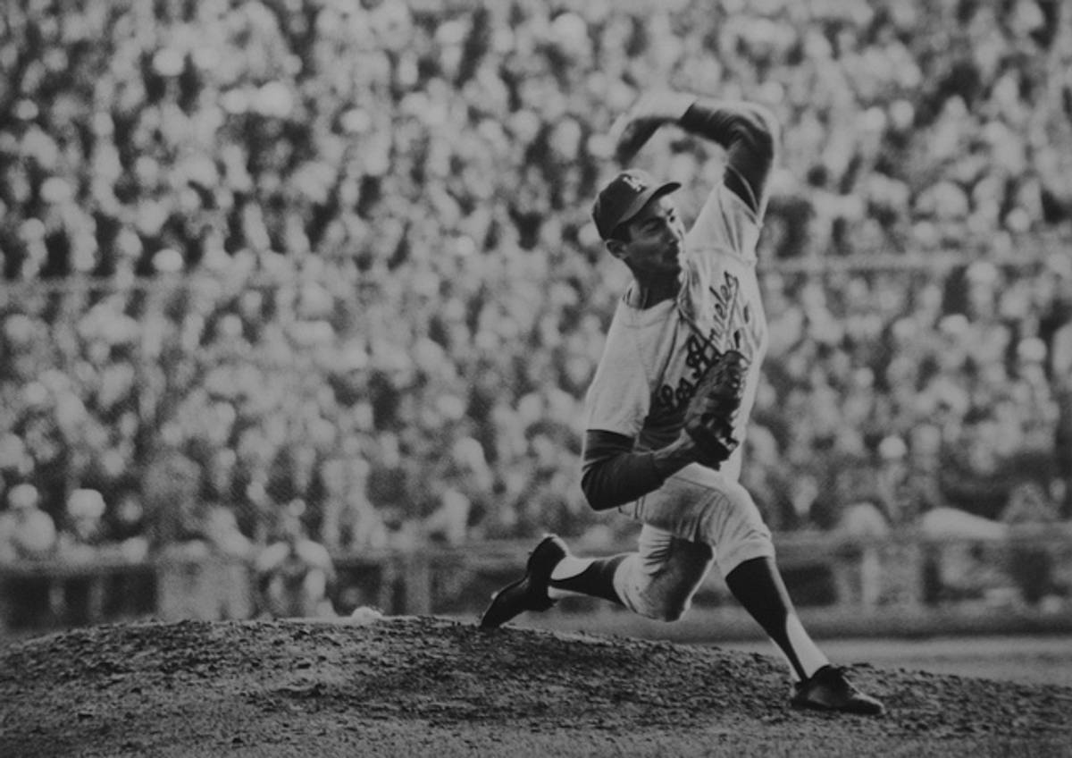 Sandy Koufax pitches during a 2-0 shutout in Game 7 of the World Series Vs. The Twins, in Minneapolis, MN, October 14, 1965. The Los Angeles Dodges won the series, Koufax won the M.V.P.(Flickr)
