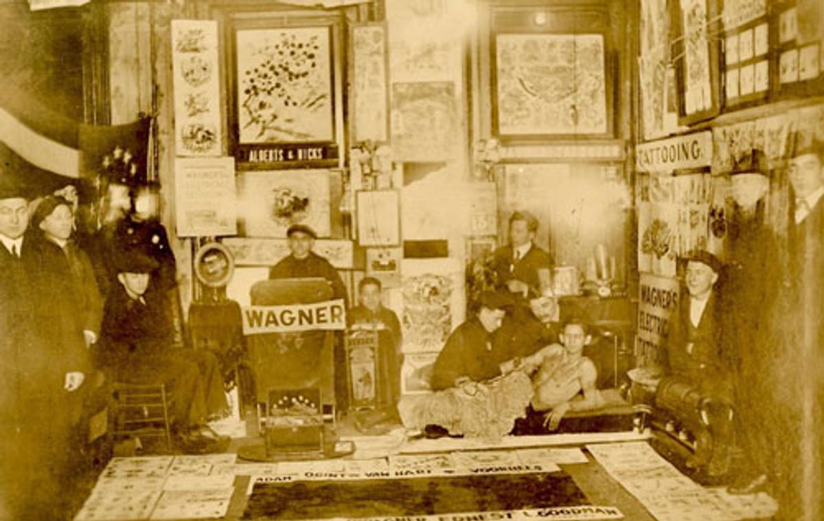 Group inside of Charlie Wagner’s tattoo shop in the Bowery, photographer unknown, circa 1910. (Photo courtesy Don Ed Hardy)