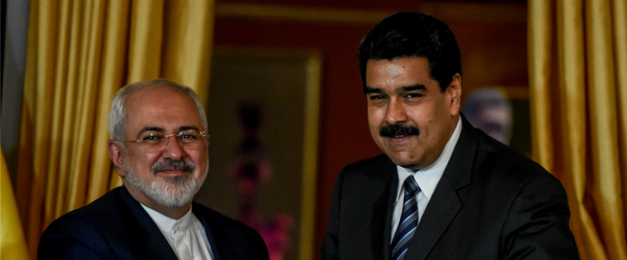 Venezuela's President Nicolas Maduro (R) and Iranian Foreign Minister Mohammad Javad Zarif meet in Caracas, August 27, 2016. 