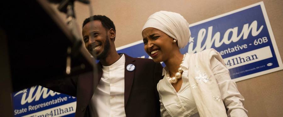 Ilhan Omar, candidate for state representative for District 60B in Minnesota, with her husband, Ahmed Hirsi, arrives for her victory party on election night, Nov. 8, 2016, in Minneapolis, Minnesota.