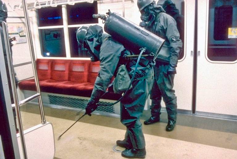 Japanese Authorities Clean Up Following a Sarin Gas Attack in 1995.(JapanSociety)