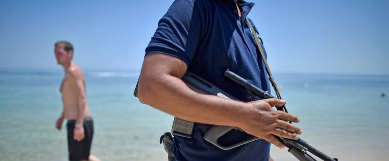 Armed police on patrol on Marhaba beach where 38 people were killed on Friday in a terrorist attack on June 28, 2015 in Souuse, Tunisia. Sousse beaches remain quiet following the Tunisia beach attack which left 38 dead, including at least 15 Britons. Around 1,000 tourists returned to the UK with more set to follow in the coming days. 