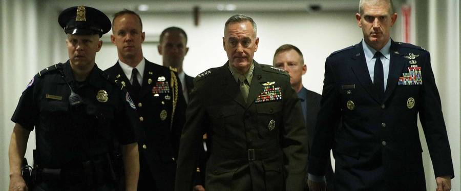 Chairman of Joint Chiefs of Staff Gen. Joseph Dunford (center) arrives at a closed briefing for Senate members May 21, 2019 on Capitol Hill. Gen. Dunford joined Secretary of State Mike Pompeo and Acting Defense Secretary Patrick Shanahan to brief congressional members on Iran.