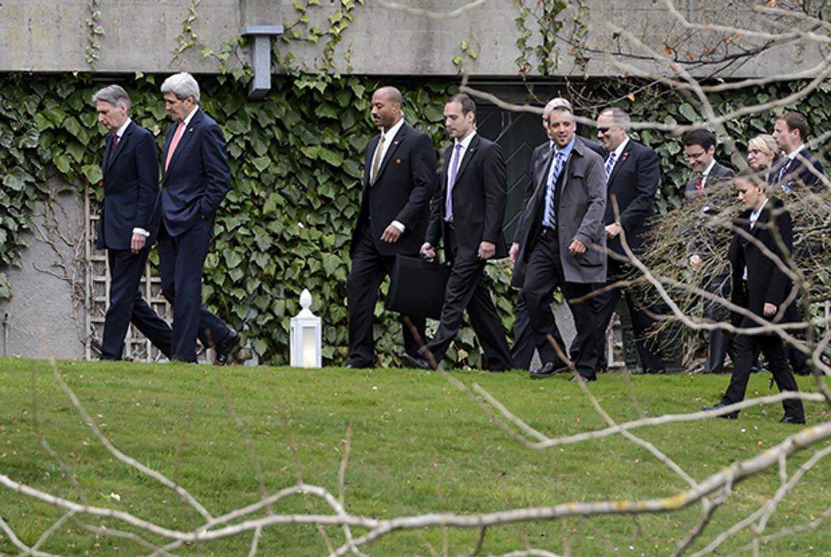 British Foreign Secretary Philip Hammond and U.S. Secretary of State John Kerry walk during a break in Iran nuclear talks on March 30, 2015 in Lausanne, Switzerland. (FABRICE COFFRINI/AFP/Getty Images)