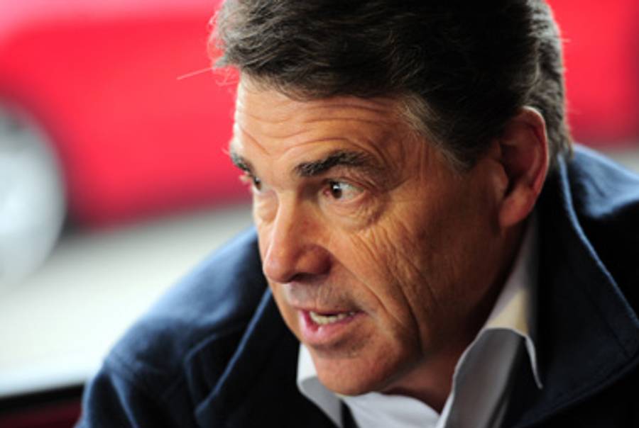 Gov. Perry in South Carolina yesterday.(Emmanuel Dunand/AFP/Getty Images)