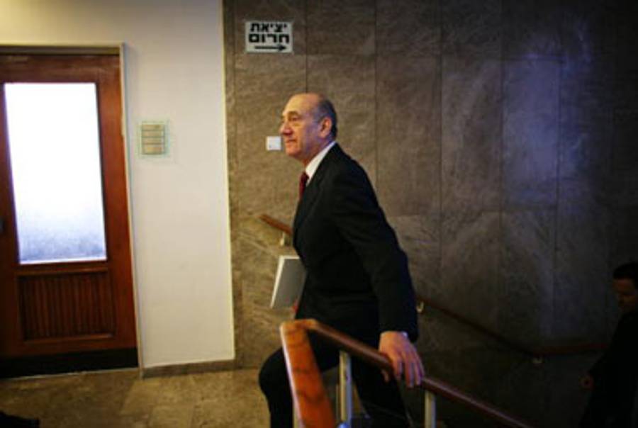 Olmert arriving at a weekly cabinet meeting in March.(Uriel Sinai/Getty Images)
