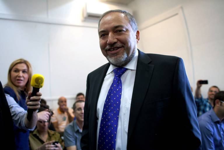  Former Israeli Foreign Minister, Avigdor Lieberman arrives in the courtroom to hear the verdict in his trial in which is he is facing charges of fraud and breach of trust, at Jerusalem Magistrates Court on November 6, 2013 in Jerusalem, Israel. (Emil Salman - Pool / Getty Images)