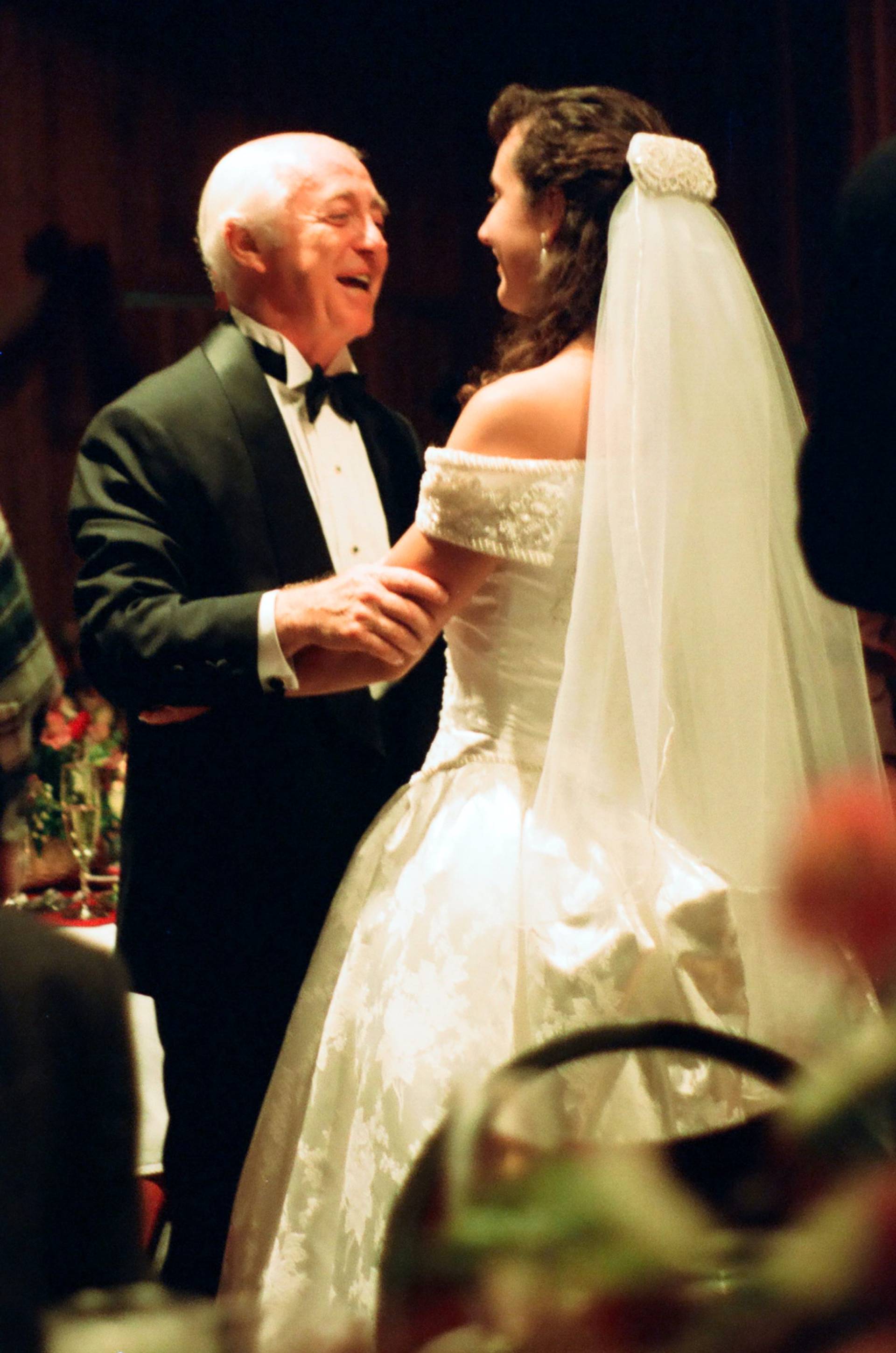 The author with her father-in-law on her wedding day
