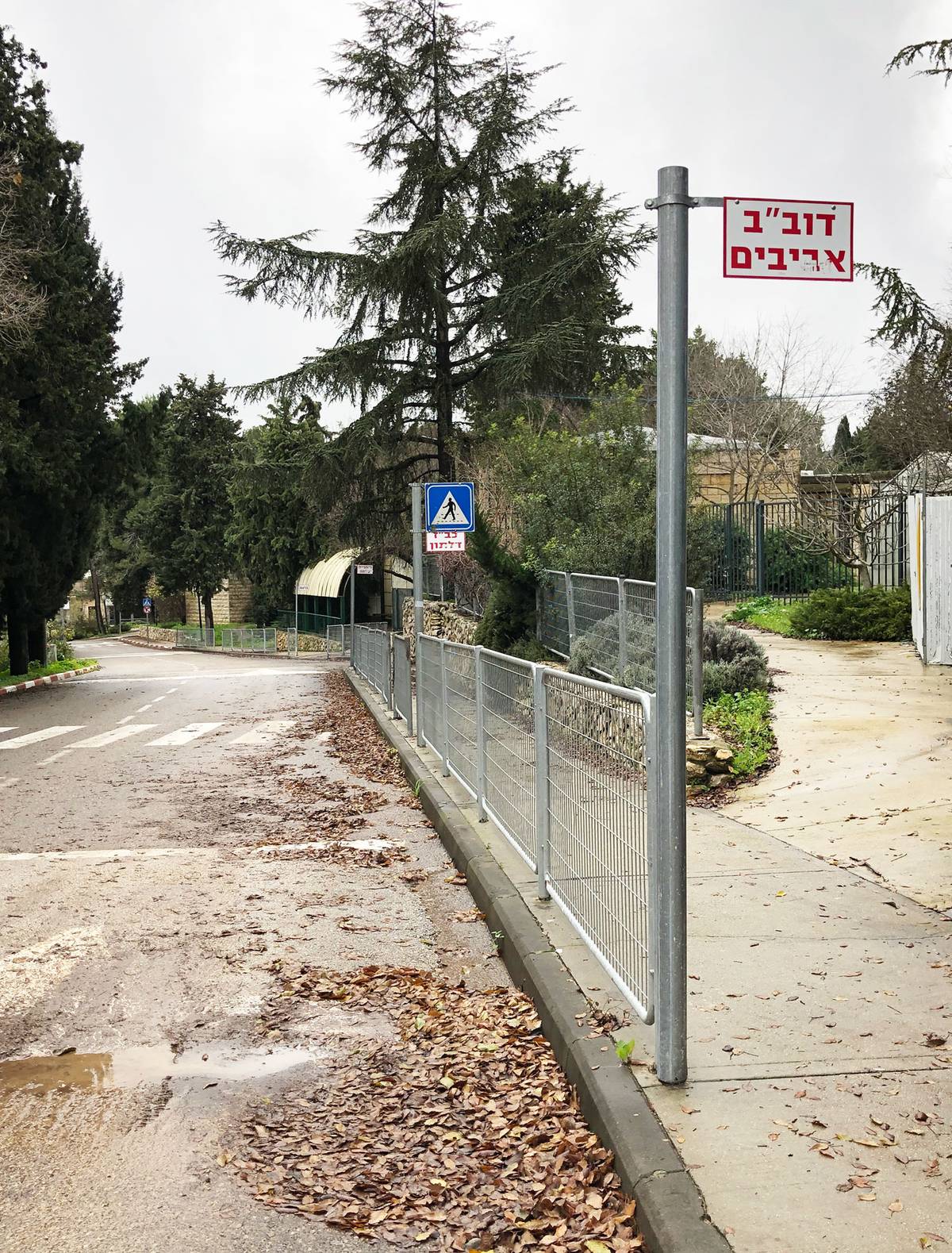 An empty school bus stop in Kibbutz Sasa