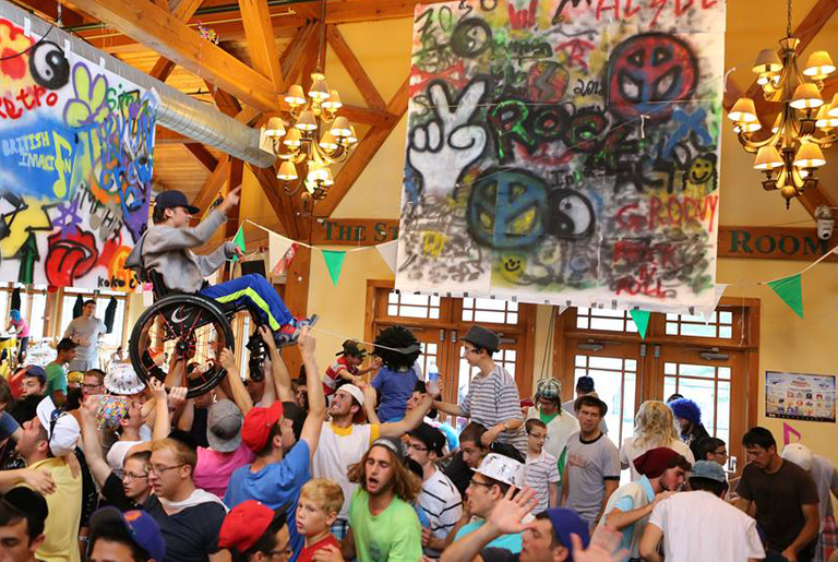 Adam Wolf is hoisted in the air in his wheelchair during mealtime.(All photos courtesy of Camp Simcha)