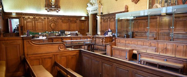 A picture taken on October 2, 2017 in Paris shows the empty court room at Paris courthouse before the opening of the trial of Abdelkader Merah who stands accused of complicity in the series of shootings commited by his jihadist brother Mohamed Merah in Toulouse and Montauban in 2012, in which three children and a teacher were killed at a Jewish school in Toulouse. The trial of Abdelkader Merah begins in Paris on October 2, 2017 who stands accused of complicity in the series of shootings commited by his jihadist brother Mohamed Merah in Toulouse and Montauban in 2012, in which three children and a teacher were killed at a Jewish school in Toulouse, as well as three French paratroopers in two other attacks, before being killed himself on March 22 following a 32-hour police siege at his flat.