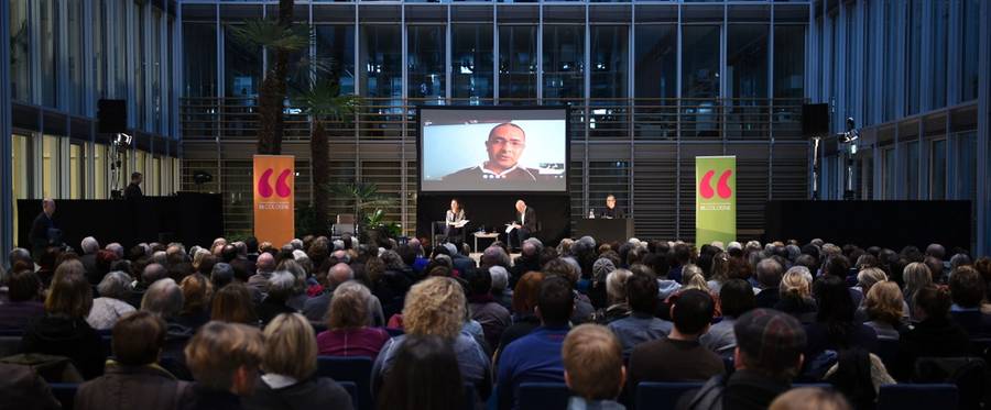 Author Kamel Daoud speaks via Skype during a reading at the Lit.Cologne international literature festival in Cologne, Germany, 13 March 2016.