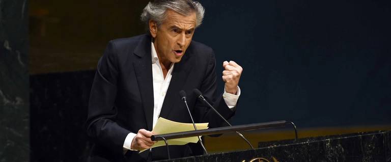 French philosopher and writer Bernard-Henri Levy speaks at the United Nations headquarters in New York on January 22, 2015 during an informal meeting of the plenary of the General Assembly to address concerns of a rise in anti-Semitic violence worldwide. 