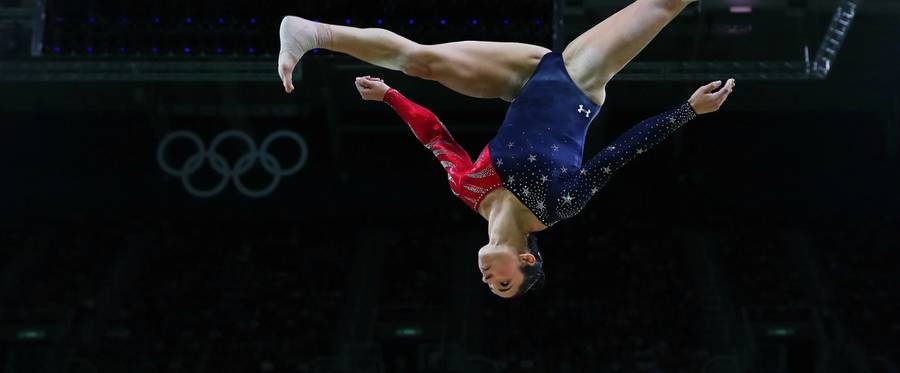 Aly Raisman of the United States competes on the balance beam during Women's qualification for Artistic Gymnastics on Day 2 of the Rio 2016 Olympic Games at the Rio Olympic Arena on August 7, 2016 in Rio de Janeiro, Brazil. 