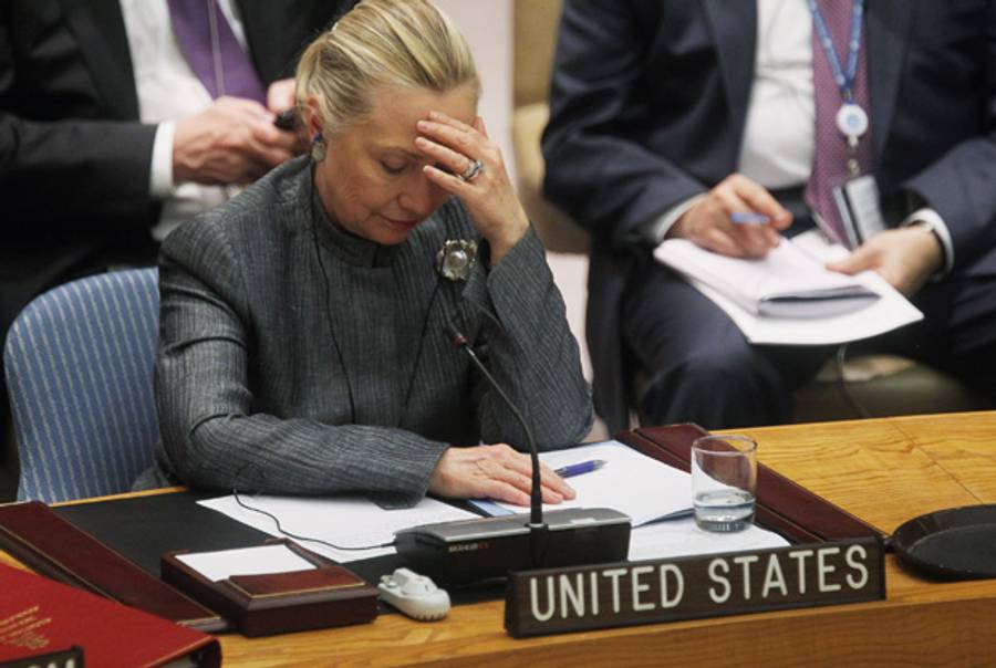 Secretary of State Clinton at the U.N. Security Council today, listening to the Syrian ambassador.(Mario Tama/Getty Images)
