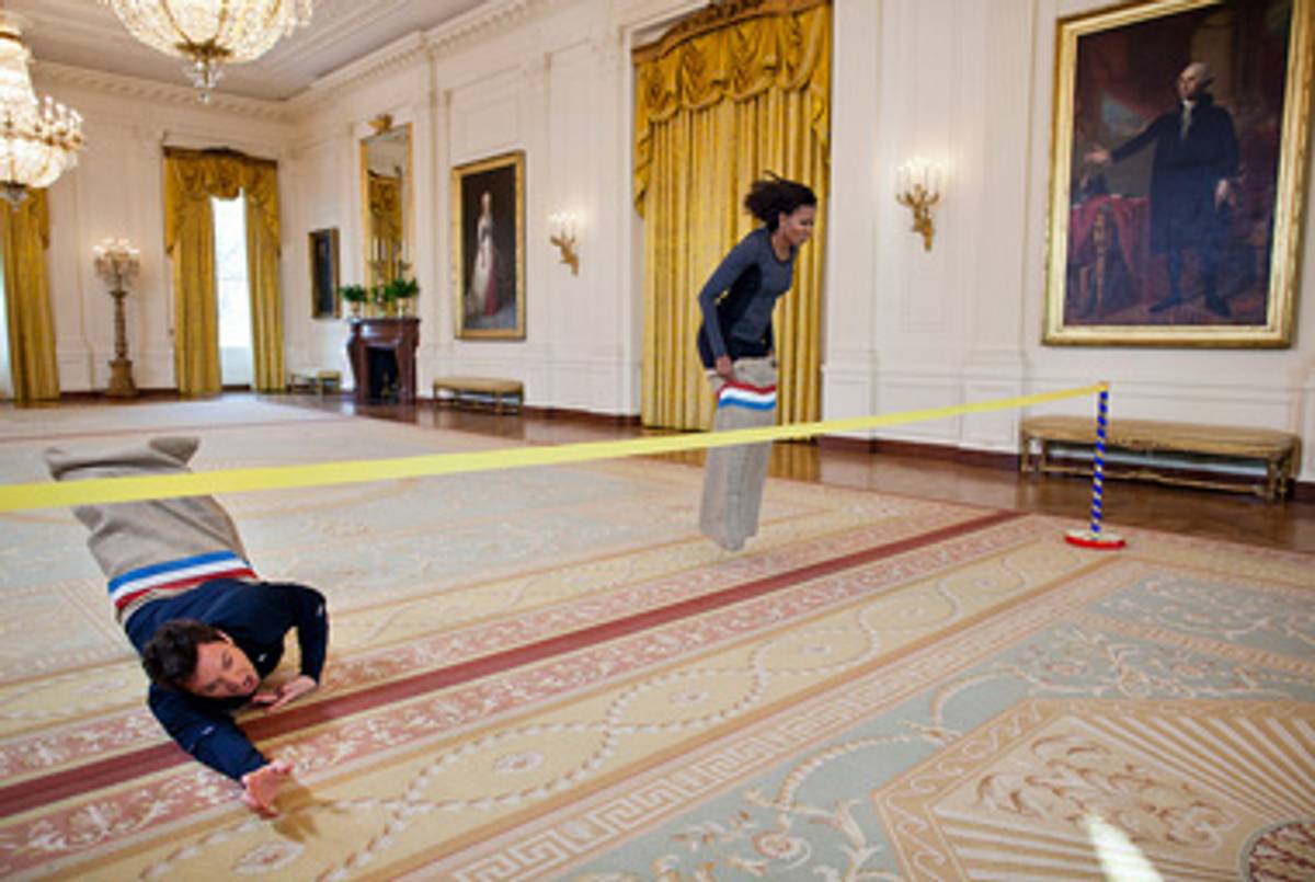 Michelle Obama and Jimmy Fallon hold a potato sack race at the White House.(White House/Flickr)
