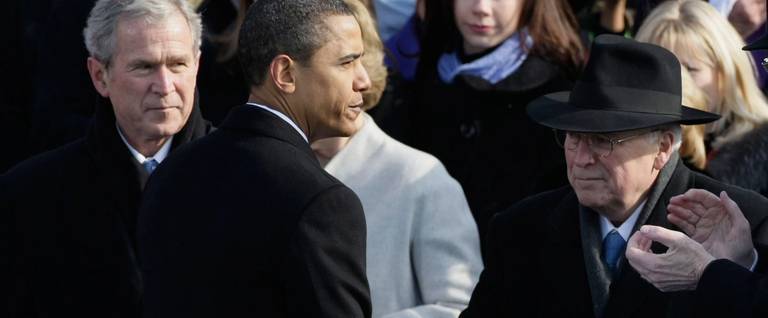 President Barack Obama shakes hand with former vice-president Dick Cheney during Obama's inauguration as the 44th President of the United States of America on the West Front of the Capitol January 20, 2009 in Washington, DC.  