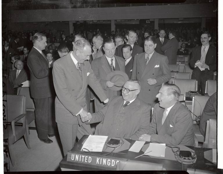 U.S. Ambassador at Large Philip Jessup, U.S. Secretary of State Dean Acheson, British Foreign Secretary Ernest Bevin, and U.S. Senator from New York John Foster Dulles in conference at the Assembly Hall of the United Nations in 1949