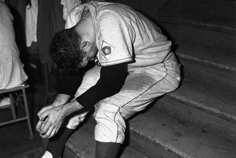 A famous photo of Ralph Branca after giving up the Shot.(Horns Fans)