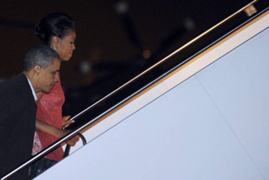 President Obama and the First Lady board Air Force One for Ireland last night.(Jewel Sama/AFP/Getty Images)