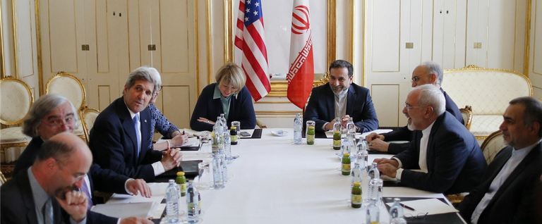 U.S. Secretary of State John Kerry (C-L) meets with Iranian Foreign Minister Mohammad Javad Zarif (2nd-R) in Vienna, Austria, July 1, 2015. 
