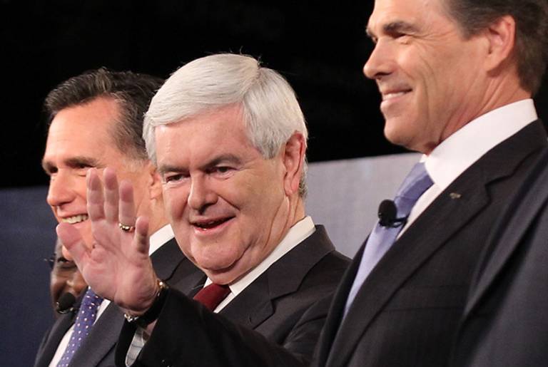 Mitt Romney, Newt Gingrich, and Gov. Rick Perry at the debate Saturday night.(Alex Wong/Getty Images)