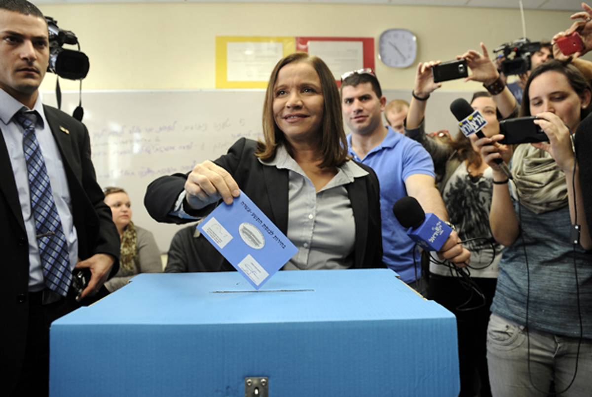 Israeli Labor party leader Shelly Yachimovich casts her vote at a polling station in the coastal city of Tel Aviv, on January 22, 2013, as Israeli go to the polls in the 19th Israeli general election. (DAVID BUIMOVITCH/AFP/Getty Images)