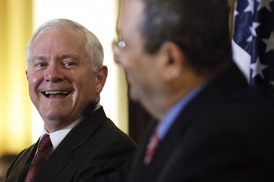 Gates smiles at Barak during this morning’s press conference.(Jim Watson/Pool/Getty Images)