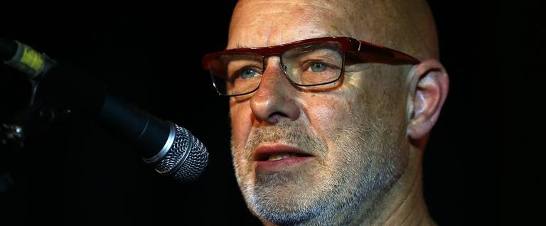 Musician and activist Brian Eno makes a speech in support of Jeremy Corbyn at a Labour party leadership rally in London, England, August 3, 2015. 