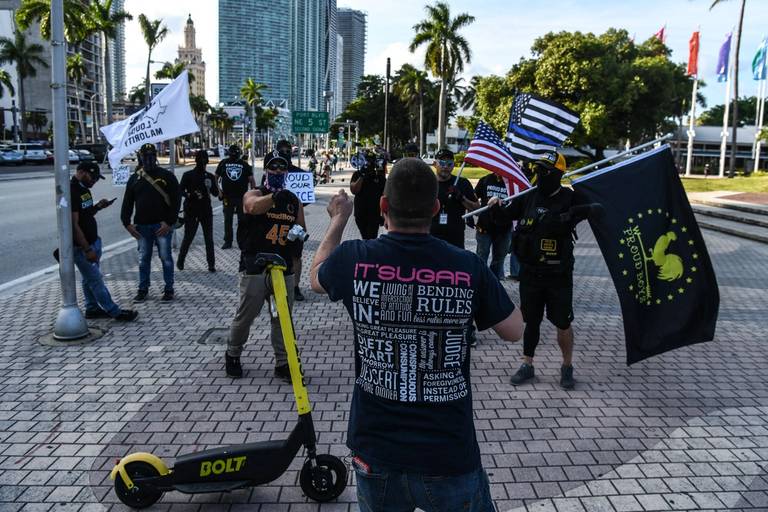 A Black Lives Matter supporter confronts members of the Proud Boys in Miami on May 25, 2021