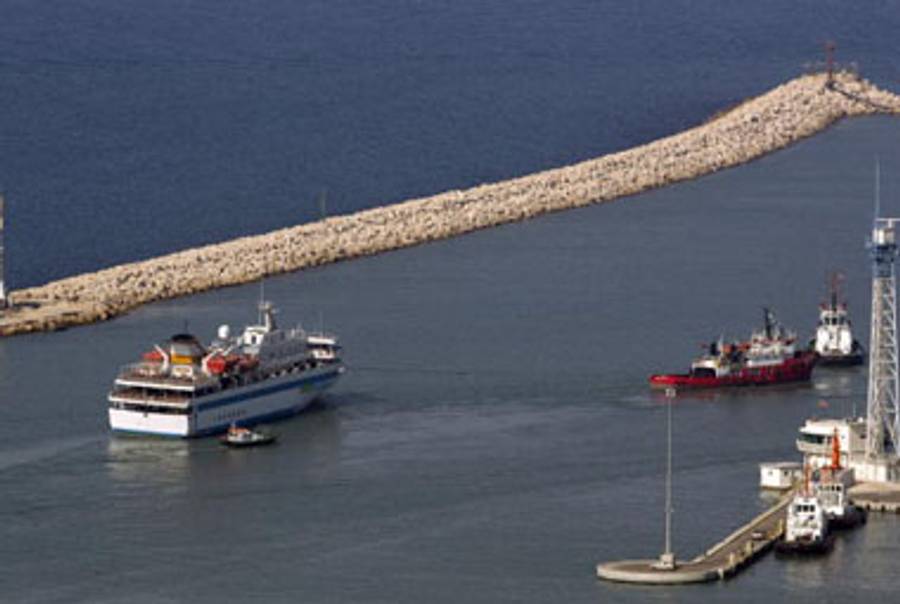 The Mavi Marmara is tugged out of Haifa harbor.(Jack Guez/AFP/Getty Images)