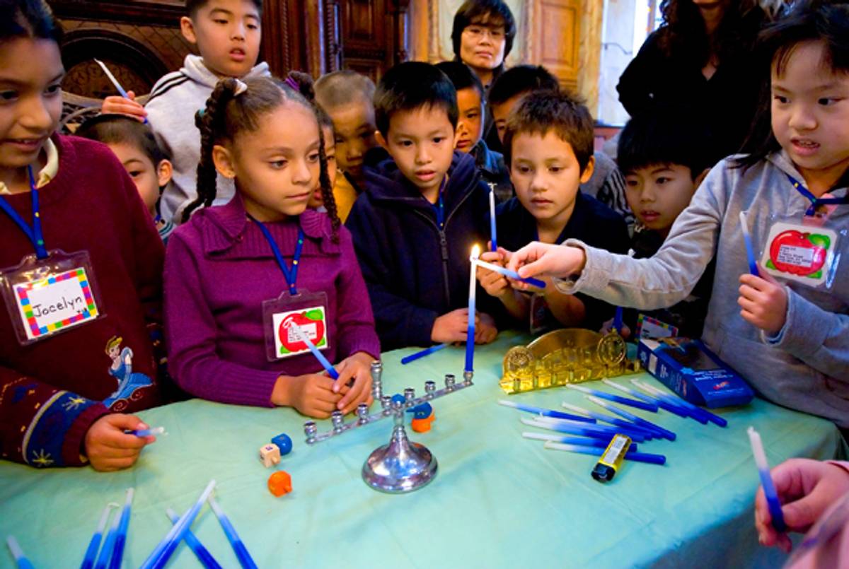 Second-graders from PS 1 learn about Hanukkah at the Eldridge St. Synagogue in New York City on Dec. 4, 2007. (Stephen Chernin/Getty Images)