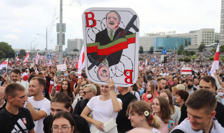 Belarusian opposition supporters attend a rally in Minsk to protest the disputed Aug. 9 presidential election results, on Sept. 6, 2020. Belarusian strongman Alexander Lukashenko has refused to quit after his disputed reelection and turned to Russia for help to stay in power.