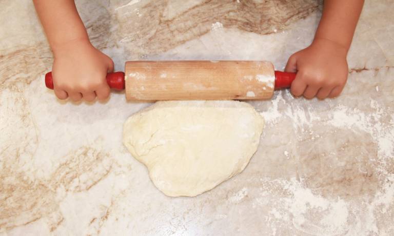 Rolling out the dough for lahm b’ajeen