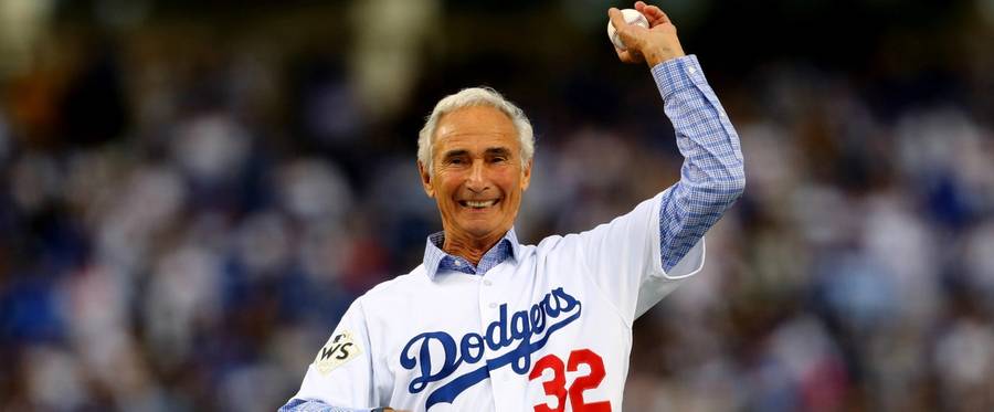 Former Los Angeles Dodgers player Sandy Koufax throws out the ceremonial first pitch before game seven of the 2017 World Series between the Houston Astros and the Los Angeles Dodgers at Dodger Stadium on November 1, 2017 in Los Angeles, California.