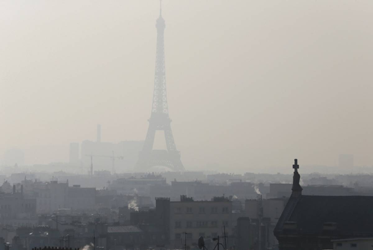 A photo taken on February 12, 2015 in Paris shows the Eiffel Tower through thick smog. (PATRICK KOVARIK/AFP/Getty Images)