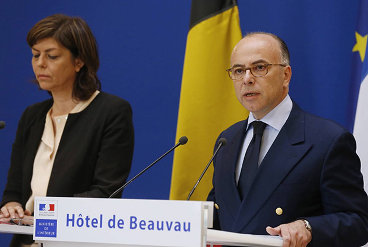 French Interior Minister Bernard Cazeneuve (R) speaks alongside Belgian Interior Minister Joelle Milquet (L) during a joint press conference in Paris, on June 1, 2014, dedicated to the recent shooting at a Jewish museum in Brussels. (THOMAS SAMSON/AFP/Getty Images))