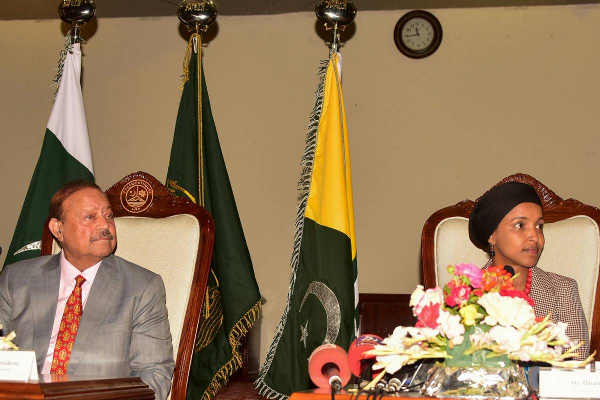 Omar with the president of Pakistan-administered Azad Kashmir, Sultan Mehmood Chaudhry, in Muzaffarabad on April 21, 2022