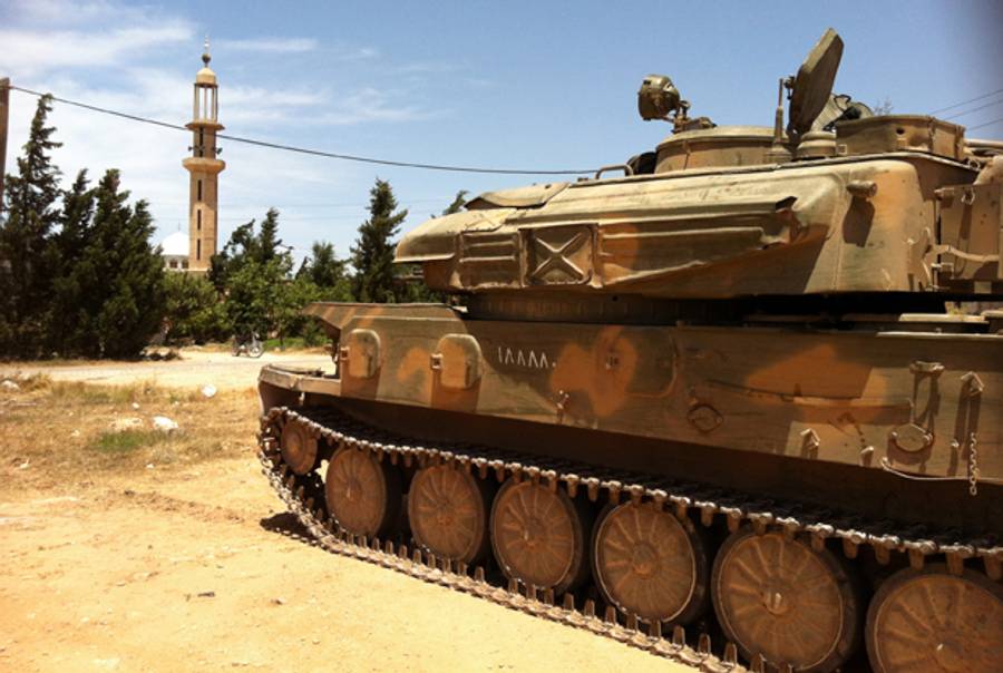 A picture taken on June 7, 2013, shows a Syrian army tank parked in Dabaa, north of Qusayr, in Syria's central Homs province(-/AFP/Getty Images)