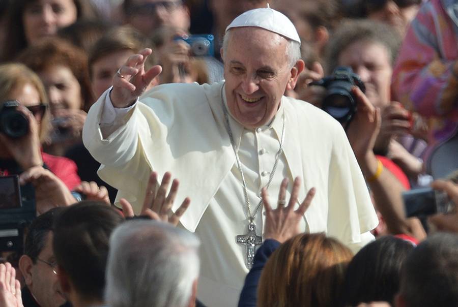 Pope Francis greets the crowd at St Peter's Square on Oct. 30, 2013.(Gabriel Bouys/AFP/Getty Images)