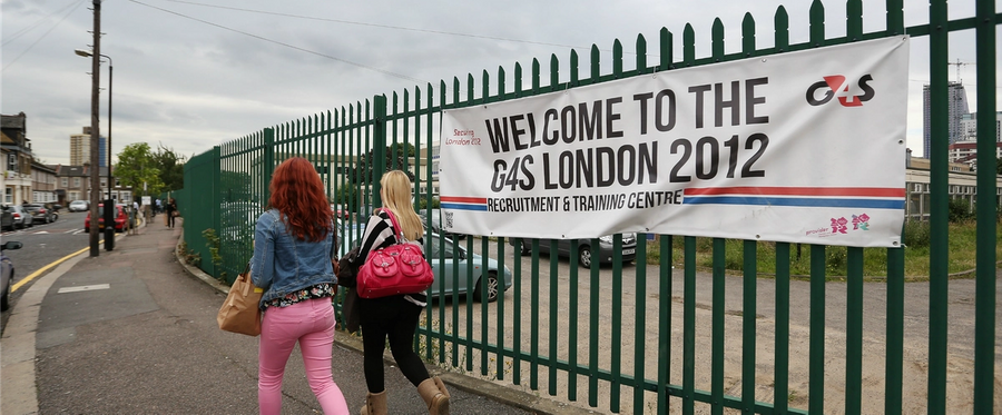 Prospective G4S employees arrive at their 'London 2012 Recruitment and Training Centre' near to the Olympic Park site on July 17, 2012 in London, England. 