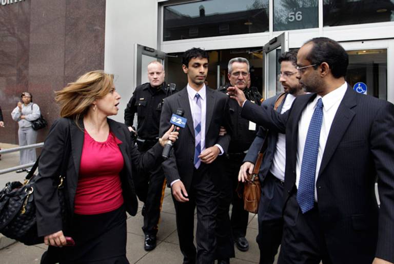 Dharun Ravi, center, leaves court in New Brunswick, N.J., on March 16, 2012.(Mel Evans/AP)