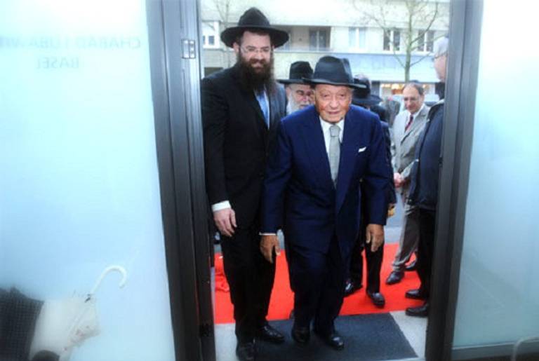 Sami Rohr enters the new Feldinger Chabad Jewish Center. The center was sponsored by Mr. Rohr in honor of the Feldingers, a Basel Jewish family who personally sheltered him during World Was II.(Lubavitch)