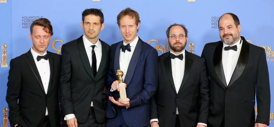 From left to right: Actors Levente Molnar and Geza Rohrig, director Laszlo Nemes, producers Gabor Sipos and Gabor Rajna, after 'Son of Saul' won won the Golden Globe for Best Foreign Language Film  in Beverly Hills, California, January 10, 2016. 